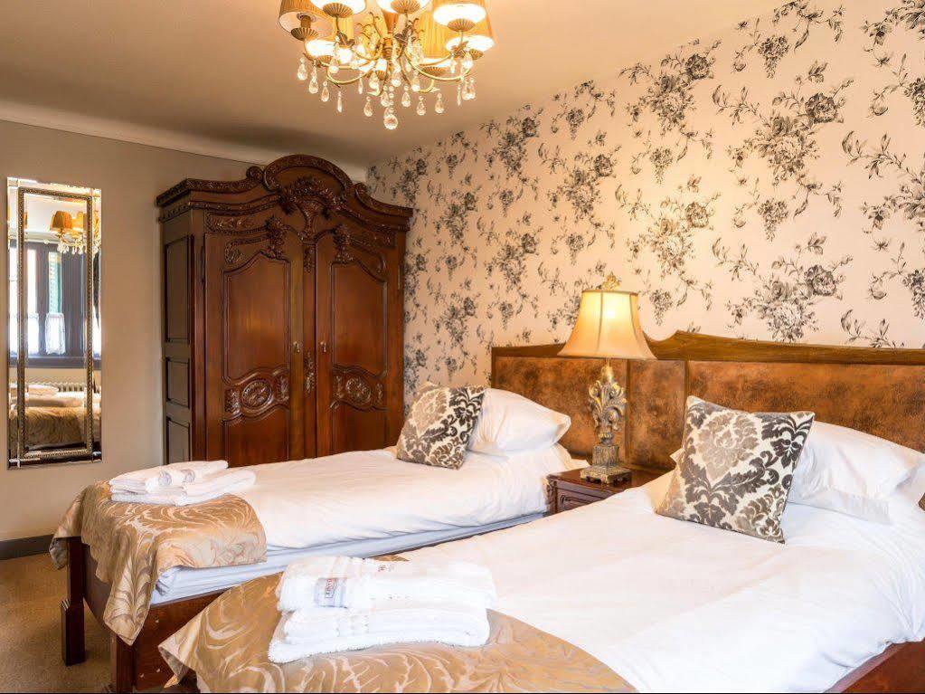 Logis Hotel De France La Chartre-sur-le-Loir Exterior foto